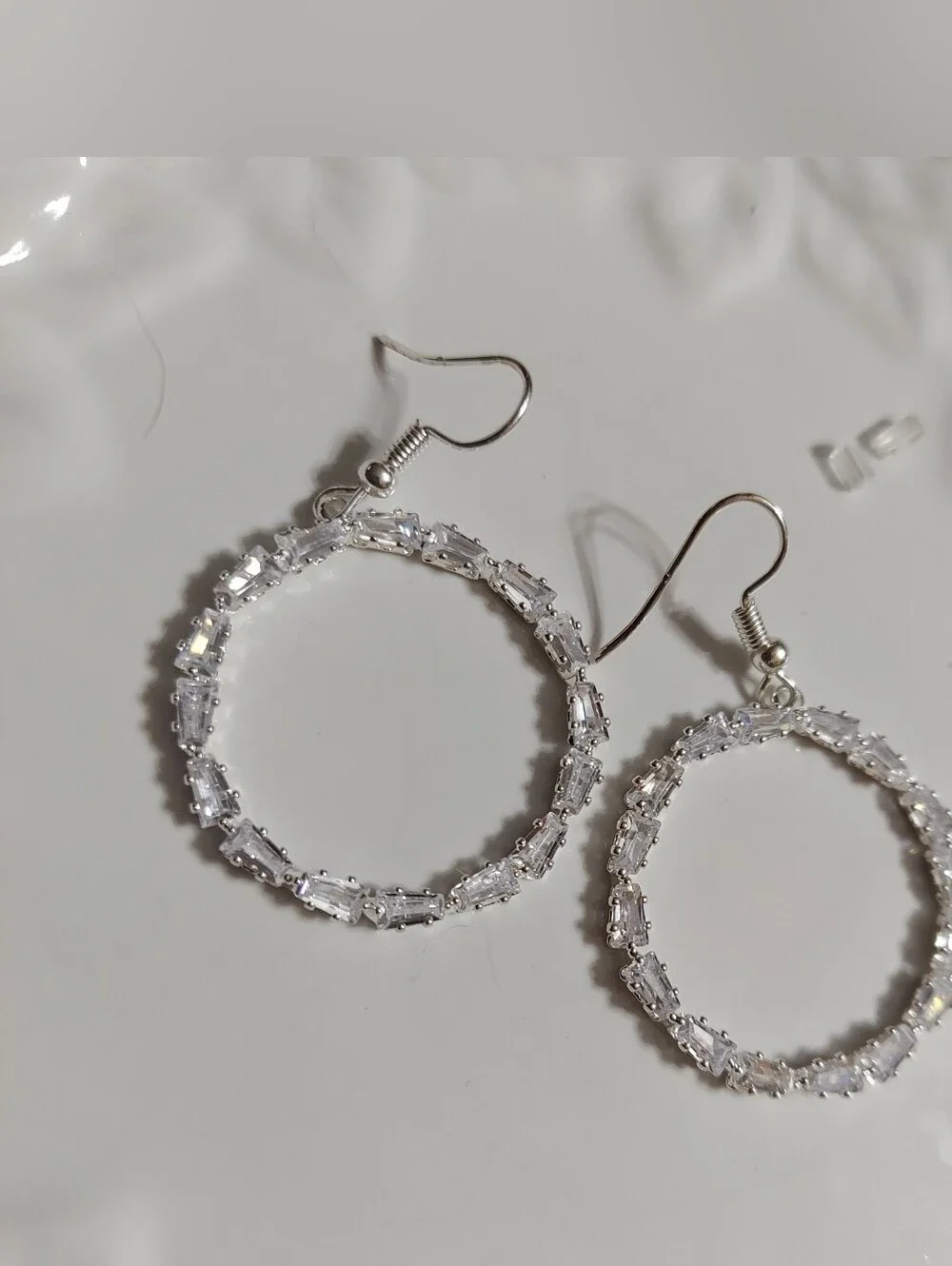 Polished Silver Tone/Faceted Cut Crystal (East-West) Design Hoop Earrings